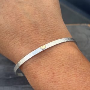 Hammered Sterling Silver with 9ct gold heart.