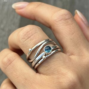Blue Topaz Wave Stack Ring, silver stack ring, blue topaz ring, London blue topaz ring, four silver rings.