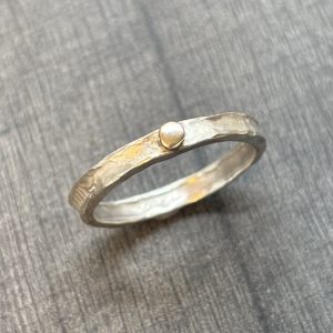 Hammered Silver Ring with flat gold button.